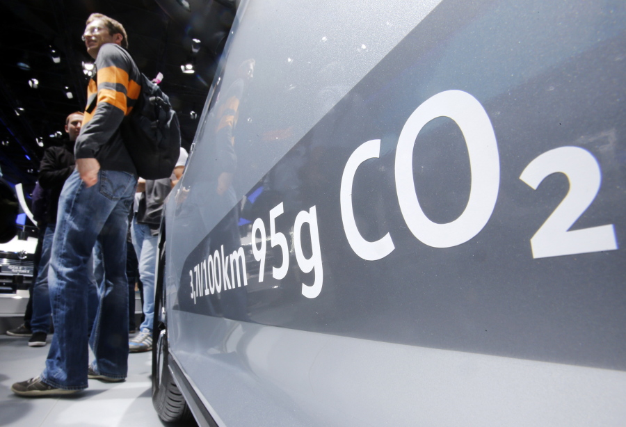The amount of carbon dioxide emissions is written on a Volkswagen Passat Diesel on Sept. 22, 2015, at the Frankfurt Car Show in Frankfurt, Germany. On Friday, April 21, 2017, a judge ordered Volkswagen to pay a $2.8 billion criminal penalty in the United States for cheating on diesel emissions tests, blessing a deal negotiated by the government for a &quot;massive fraud&quot; orchestrated by the German automaker.