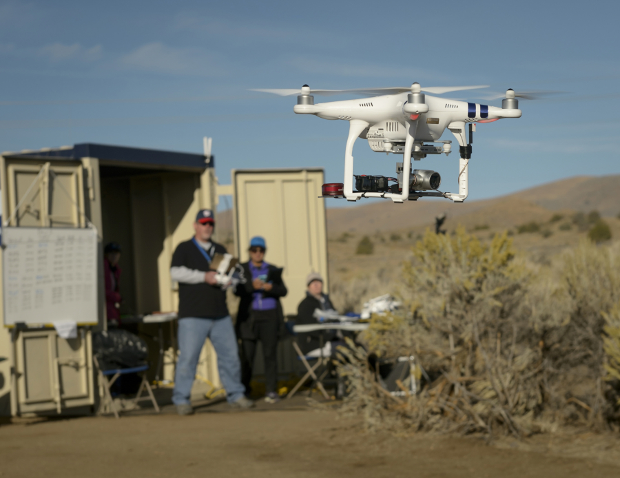 Dominic Hart/NASA Ames
Drone Co-habitation Services operates a Phantom 3 commercial drone, one of 11 vehicles in a NASA field demonstration in Nevada.