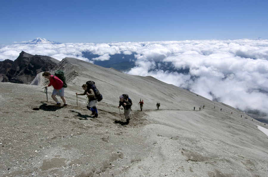Climbers reach within 25 feet of the 8,363-foot summit on Mount St. Helens in 2006. Permits to climb the destination are sold out for the summer.