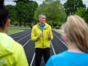 Dave Caldwell, center, coach at Whisper Running, teaches not only the mechanics of running, but also how to navigate mental barriers to success.
