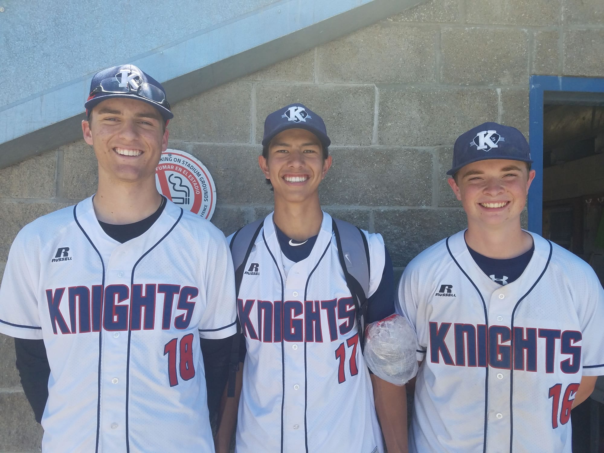 From left, Damon Casetta-Stubbs, Sam Lauderdale, and Cooper Conway of the King's Way Christian baseball team