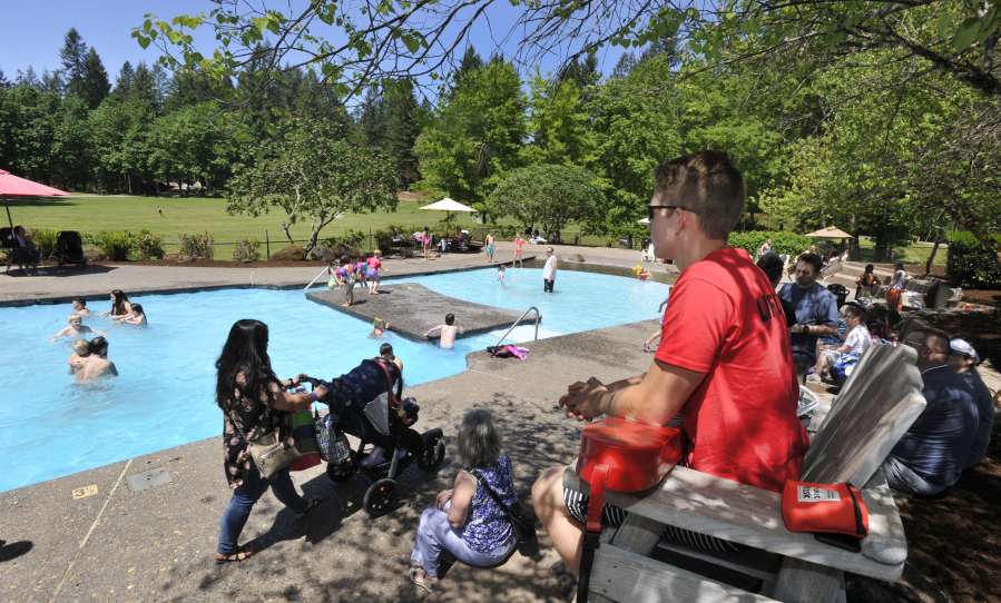 A.J. Ragsdale, right, is in his sixth year as a lifeguard at the pool at Alderbrook Park in Brush Prairie. The park employs between 20 to 100 people, depending on its event schedule, according to event specialist Chris Bryden.