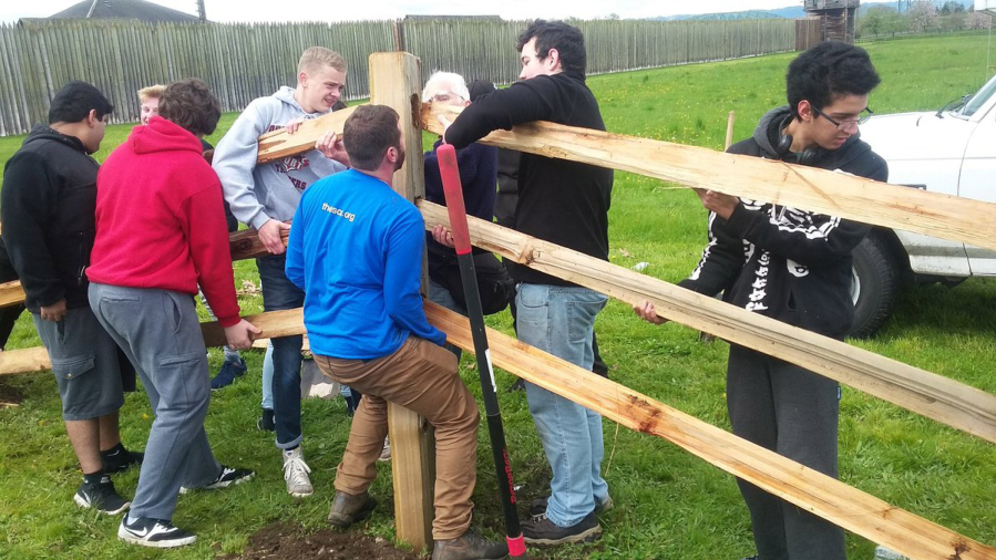 Meadow Homes: Fort Vancouver High School&#039;s Center for International Studies students participated locally in Global Service Day, working throughout Vancouver on various projects, including building a split-rail fence at the fort.