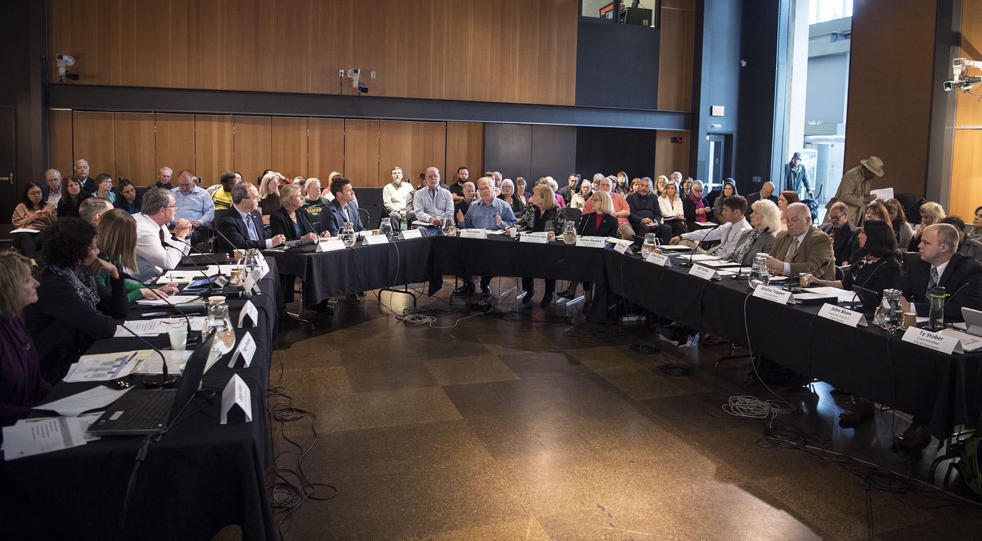 The Vancouver City Council and the Clark County council discuss homelessness during a meeting Monday evening at the Vancouver Community Library.