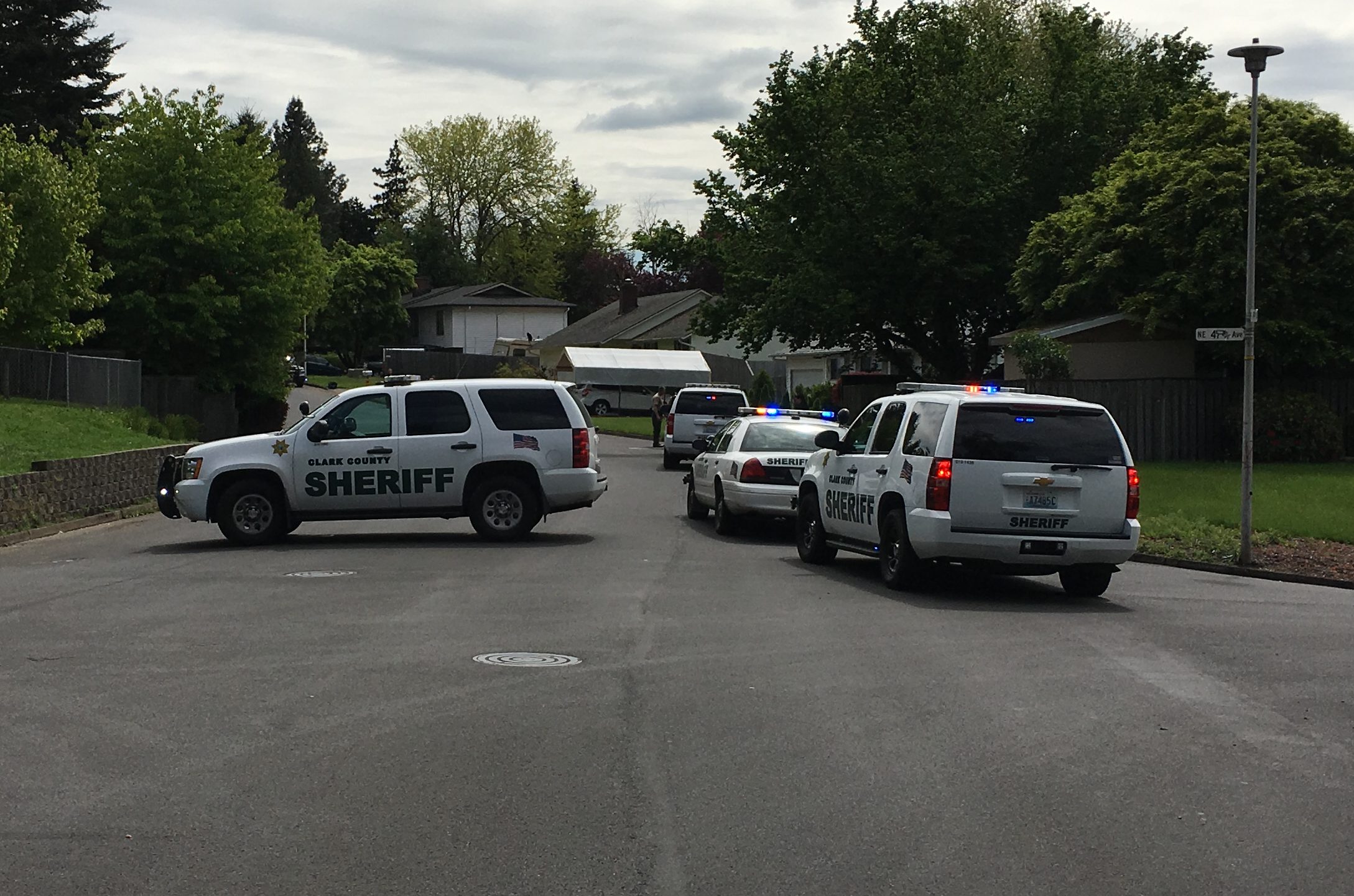Sheriff's deputies respond to Northeast 49th Avenue in the Truman neighborhood after man with a gunshot wound arrived home there Thursday morning.