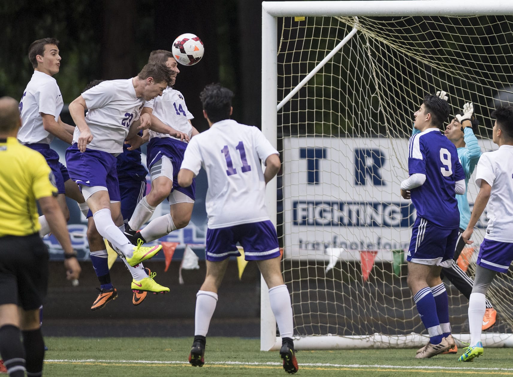 Columbia River’s Ryan Connop (23), heads the ball into the goal in what was initially thought to be the fourth goal for Columbia River during overtime in the first round of the 2A state playoffs against Highline at the Kiggins Bowl in Vancouver, Tuesday May 16, 2017.