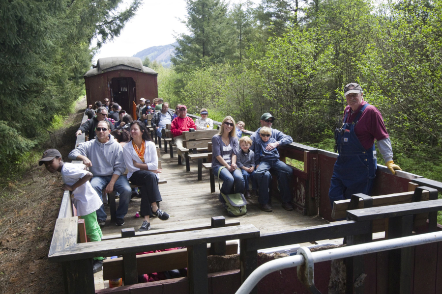 Visitors enjoy a train ride through a scenic area on the Chelatchie Prairie Railroad train in Yacolt.