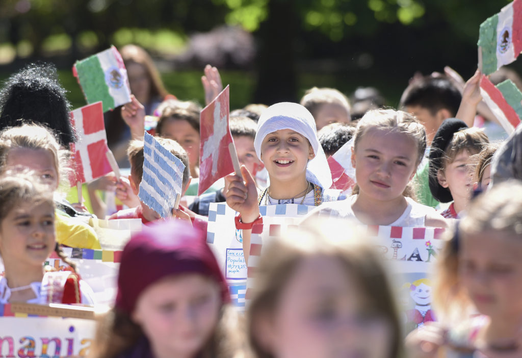 Eisenhower Elementary School third-graders march together Friday in the annual Children’s Culture Parade at Fort Vancouver National Historic Site.