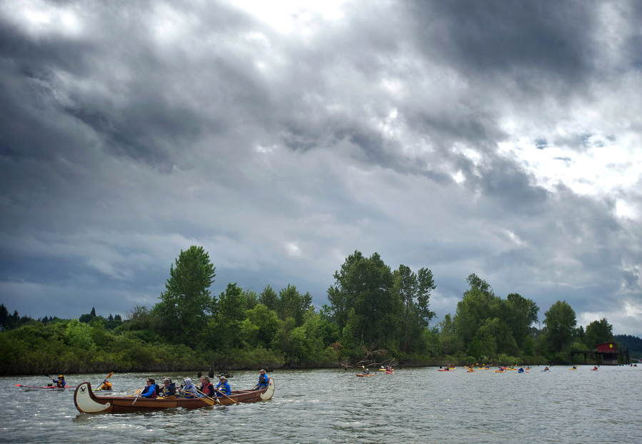 Dignitaries and members of the public paddle down Lake River to the Columbia River during the Big Paddle event and learn about historic, cultural and environmental sites along the way.