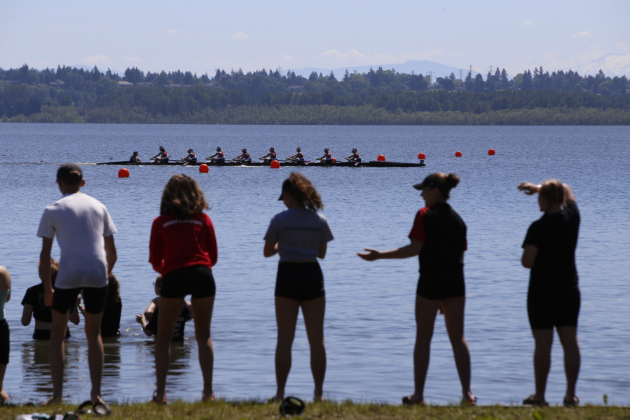 Fans watch from the shore at the U.S. Rowing Northwest Youth Championships at Vancouver Lake.