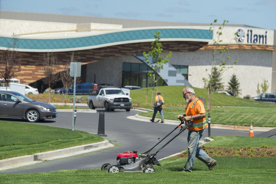 James Doane of C&R Tractor and Landscape keeps the front lawn at Ilani Casino Resort near La Center looking sharp. The casino, which opened April 24, has received 8,000 to 10,000 visitors per day, officials said.