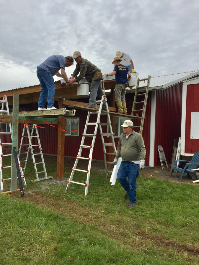 Battle Ground: Rotarians from various clubs around Clark County participated in Rotarians Day at Work on April 29, helping with a bunch of tasks at Silver Buckle Ranch.