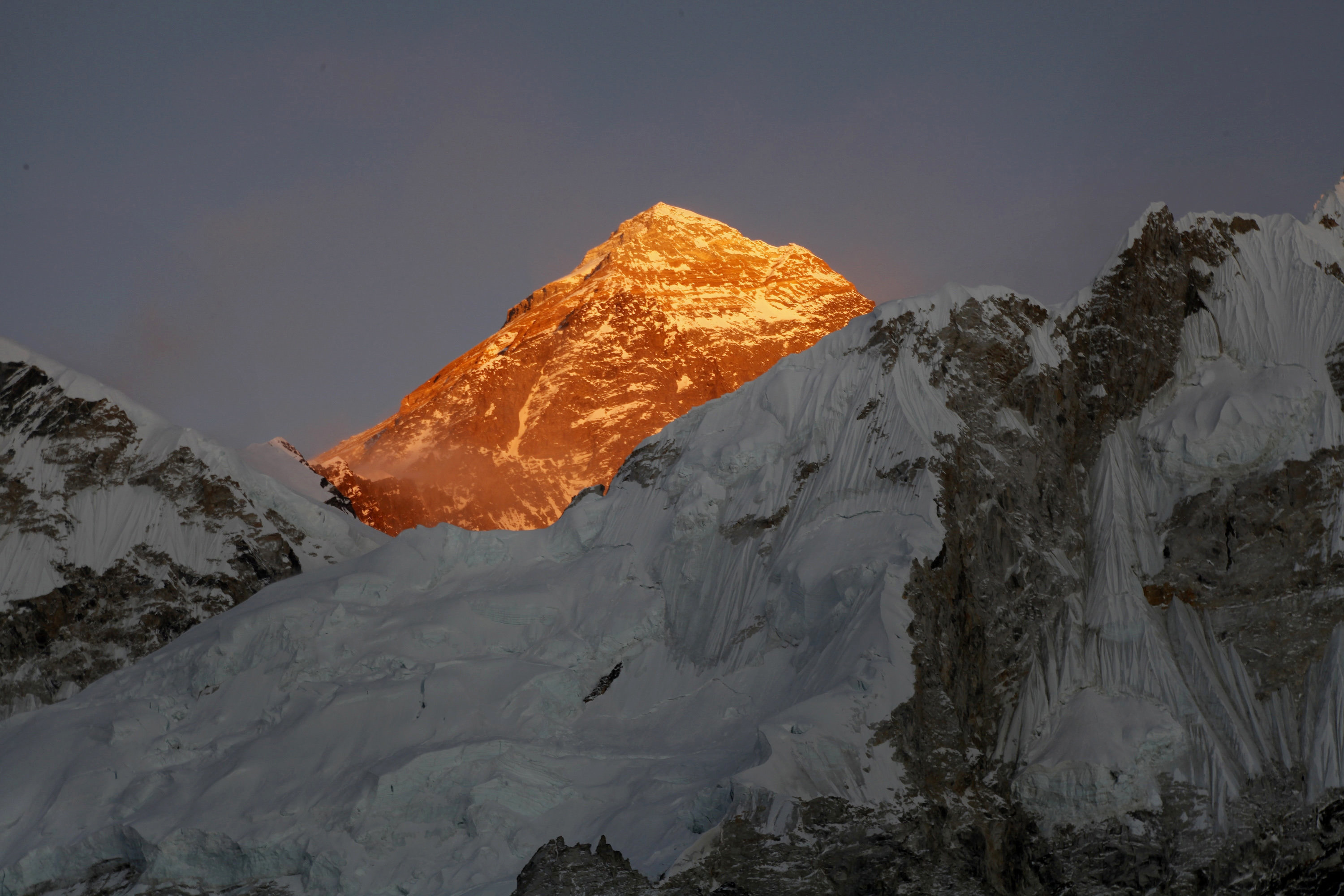 FILE - In this Nov. 12, 2015, file photo, Mt. Everest is seen from the way to Kalapatthar in Nepal. An American climber has died near the summit of Mount Everest and an Indian climber is missing after heading down from the mountain following a successful ascent, expedition organizers said Sunday.