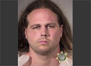 This booking photo provided by Multnomah County Sheriff's Office shows Jeremy Joseph Christian. Authorities on Saturday, May 27, 2017 identified Christian as the suspect in the fatal stabbing of two people on a Portland light-rail train in Oregon.