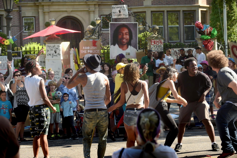 Protesters chant and dance during a demonstration in front of the governor’s residence July 24 in St. Paul, Minn., against the July 6 shooting death of Philando Castile by St. Anthony Police Officer Jeronimo Yanez while making a traffic stop in Falcon Heights, Minn. Jury selection begins Tuesday, May 30, 2017, for Yanez.