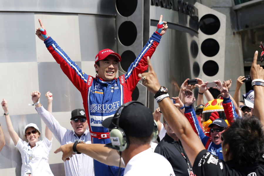 Takuma Sato, of Japan, celebrates after winning the Indianapolis 500 auto race at Indianapolis Motor Speedway, Sunday, May 28, 2017, in Indianapolis.