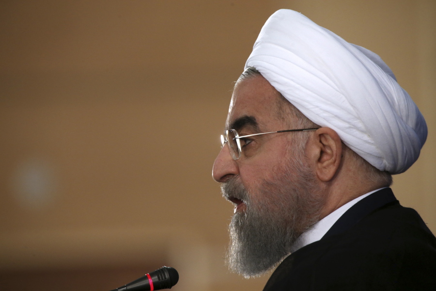 Iranian President Hassan Rouhani speaks in a press conference in Tehran, Iran, Monday, May 22, 2017. Iran's newly re-elected President Hassan Rouhani on Monday called relations with the United States "a curvy road," saying he hoped the Trump administration will "settle down" enough for his nation to better understand it.