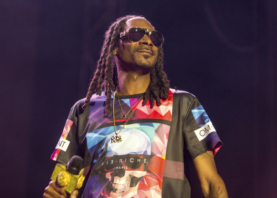 FILE - In this Sept. 26, 2015 file photo, Snoop Dogg performs during the Life is Beautiful festival in Las Vegas. Snoop Dogg's latest release, "Neva Left" will be released on Friday, May 19, 2017. (Photo by Paul A.