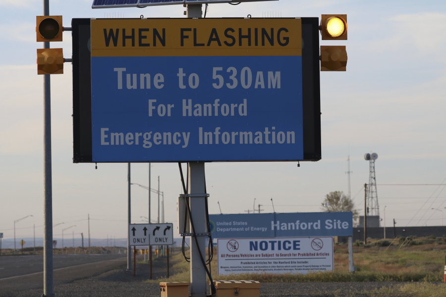 An emergency sign flashes by the Hanford Nuclear Reservation on Tuesday in Richland. A portion of an underground tunnel containing rail cars filled with radioactive waste collapsed at a sprawling storage facility in a remote area of Washington state, forcing an evacuation of some workers at the site that made plutonium for nuclear weapons for decades after World War II.