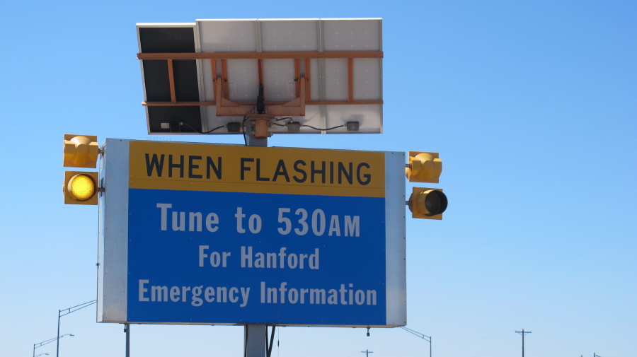 A sign indicates a radio station that provides emergency information for the Hanford Nuclear Reservation near Richland. Nicholas K.