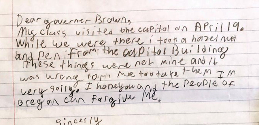 A portion of an apology letter from a fourth-grader to Oregon Gov. Kate Brown explains that his class had toured the Capitol on a field trip in April and how he took a hazelnut and a pen from the Capitol Building. Saerom England/Office of Oregon Gov.
