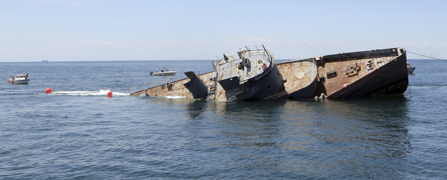 The U.S. Coast Guard cutter Tamaroa sinks Wednesday off the coast of Cape May, N.J.