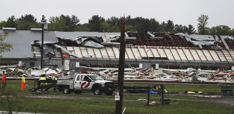 A tornado flattened a turkey farm near the trailer park Tuesday in Chetek, Wis., during powerful spring storms that battered an area from the South Plains of Texas to the Great Lakes.