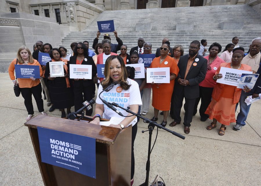 Lucy McBath, National Spokeswoman for Moms Demand Action for Gun Sense in America, is joined by faith leaders, gun violence survivors and others on the south steps of the Mississippi State Capitol in Jackson, Miss., on March 17, 2016. McBath is afraid many more people will die if Florida Gov. Rick Scott signs a bill making it harder to prosecute when people claim they commit violence in self-defense. She already lost her son, an unarmed black teenager, when a white man angry over loud music and claiming self-defense fired at an SUV filled with teenagers. The measure before Scott would effectively require a trial-before-a-trial whenever someone invokes self-defense, making prosecutors prove the suspect doesn't deserve immunity.