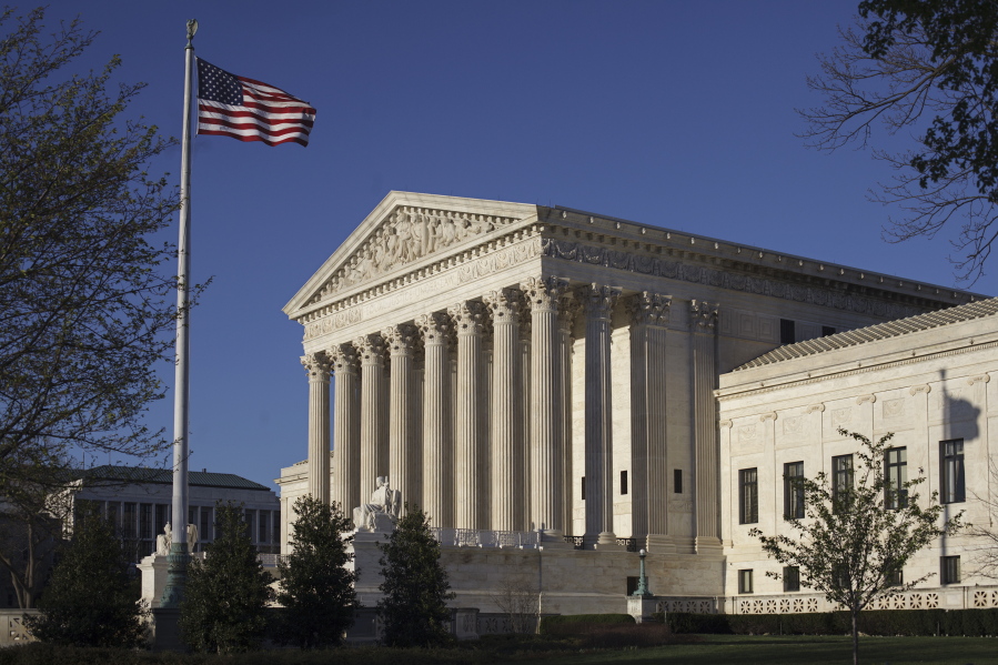In this photo taken April 4, 2017, the Supreme Court Building is seen in Washington. The Supreme Court struck down two congressional districts in North Carolina Monday, May 22, 2017, because race played too large a role in their creation, a decision voting rights advocates said would boost challenges in other states. (AP Photo/J.