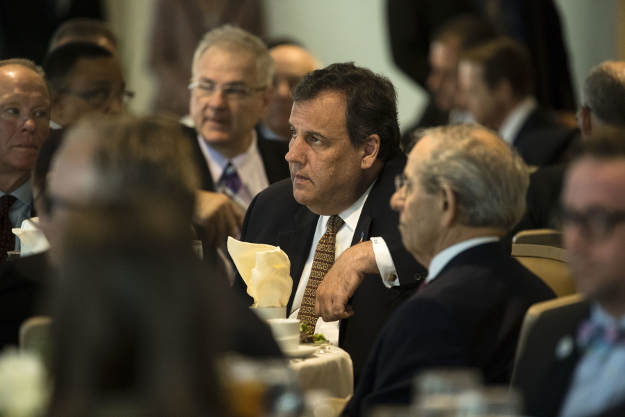 New Jersey Gov. Chris Christie listens to Dan Hilferty, president and chief executive officer of Independence Blue Cross speaks during Caron Treatment Center’s Executive Luncheon on the Opioid Crisis at the headquarters of Independence Blue Cross in Philadelphia on Thursday.