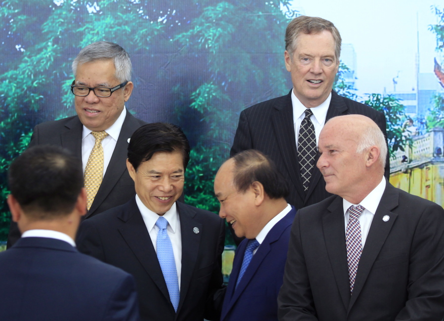 U.S Trade Representative Robert Lighthizer, top right, meets with officials at the Asia-Pacific Economic Cooperation Trade ministerial meeting in Hanoi, Vietnam Saturday.
