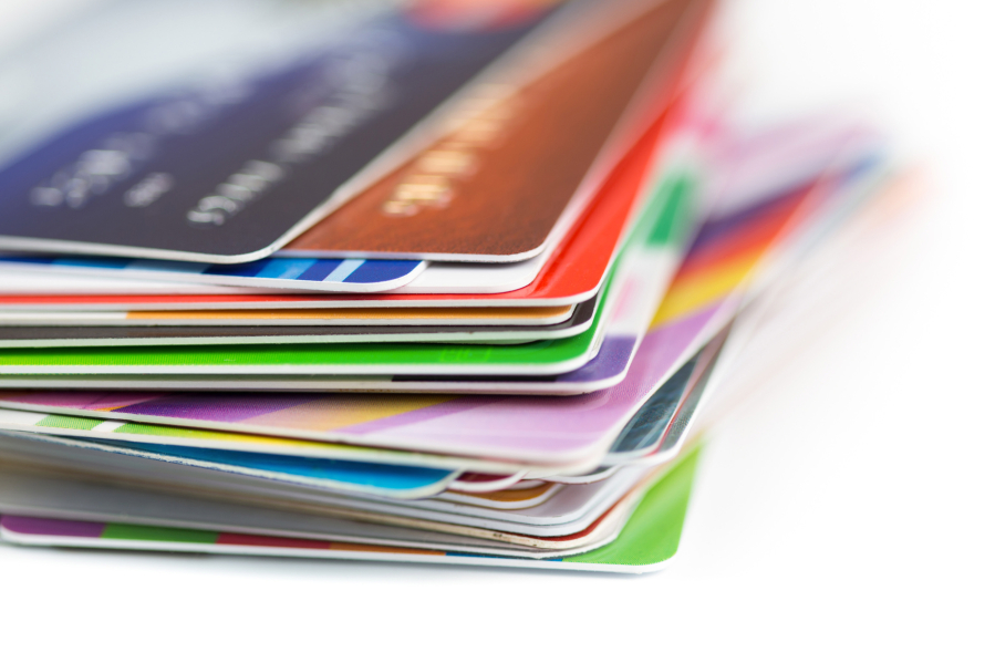 According to a new report, almost half of credit card accounts in the U.S. carry balances from month to month.
