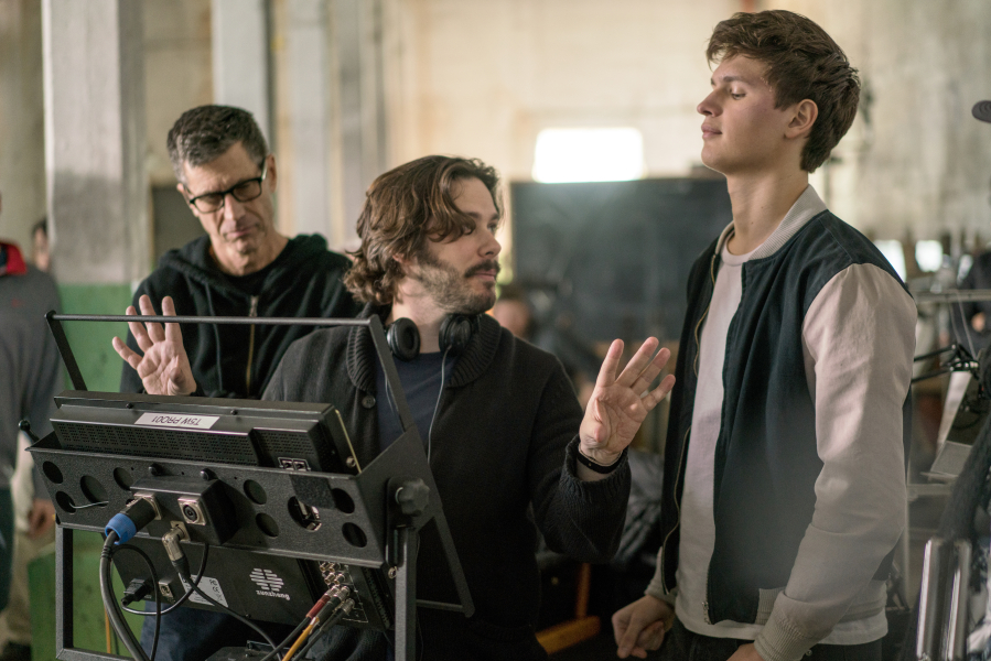 Director Edgar Wright, center, with director of photography Bill Pope, left, and Ansel Elgort on the set of “Baby Driver.” Wilson Webb/TriStar Pictures