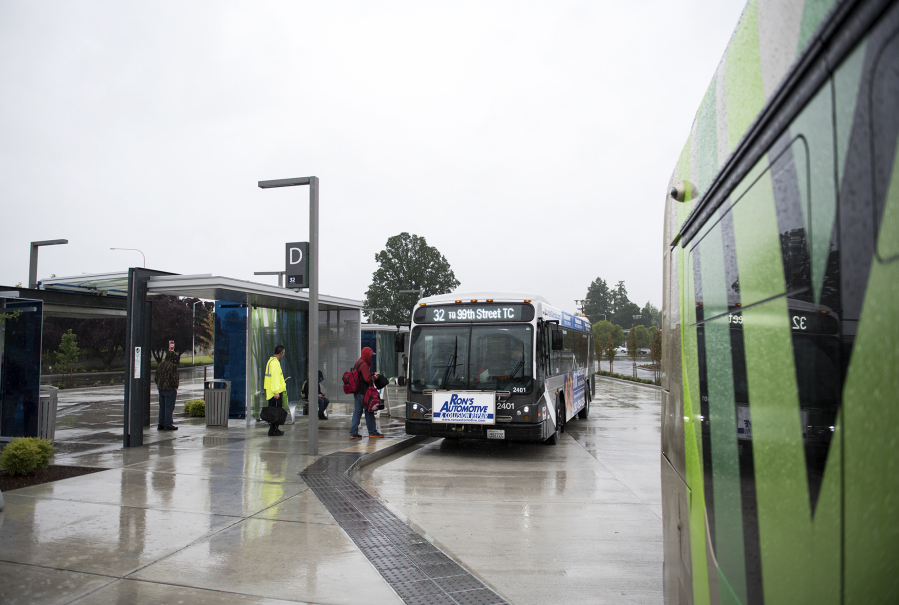 Passengers board a bus the Southside Vancouver Mall Transit Center on Thursday afternoon. The station serves The Vine as well as several other fixed routes including the 32, 7, 72, 73, 74, 78 and 80.