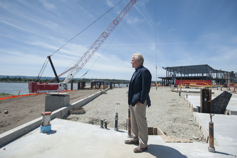 Barry Cain, owner of Gramor Development, at The Waterfront Vancouver during ongoing construction. Cain, his company and the city of Vancouver spent more than a decade working to break ground on the 21-block development.