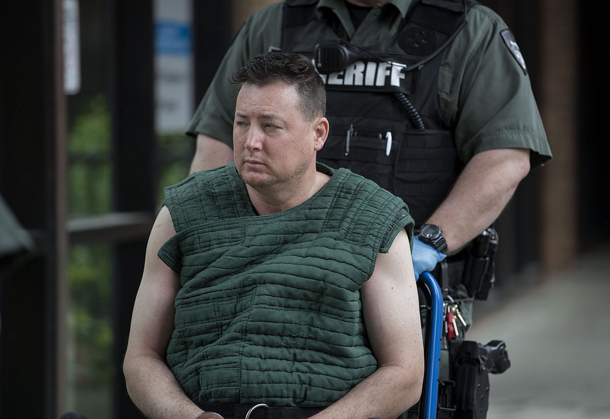 Andrew Lee Lehr, a robbery suspect who led police on a high-speed pursuit, prepares to make a first appearance in Clark County Superior Court on Thursday morning.