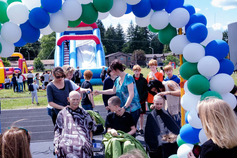East Vancouver: Cascade Middle School students and community members raised $7,984 for childhood cancer research during a head-shaving fundraiser June 1.
