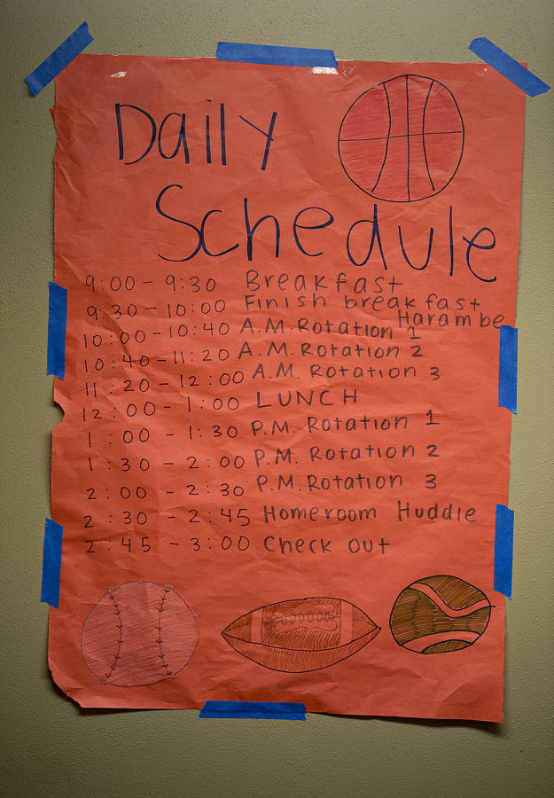 The daily schedule for Project Transformation is posted on the wall for participants at Vancouver First United Methodist Church on Thursday morning. Children kindergarten through sixth grade are at the program from 9 a.m. to 3 p.m., maintaining a schedule similar to their school day. Organizers say that helps ease the transition from summer into school.
