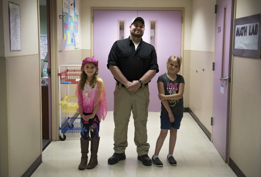 Hockinson Heights Elementary School’s Makena Nelson, from left, Tucker Cendana and Kaylin Oliver teamed up to help a choking student during lunch last month.