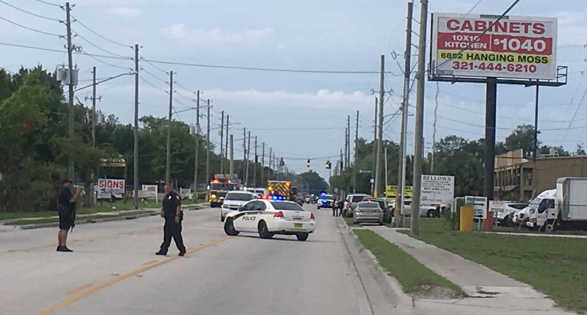Police work near the scene of a shooting where they said there were multiple fatalities in an industrial area near Orlando, Fla., Monday, June 5, 2017. The Orange County Sheriff's Office said on its official Twitter account that the situation has been contained.
