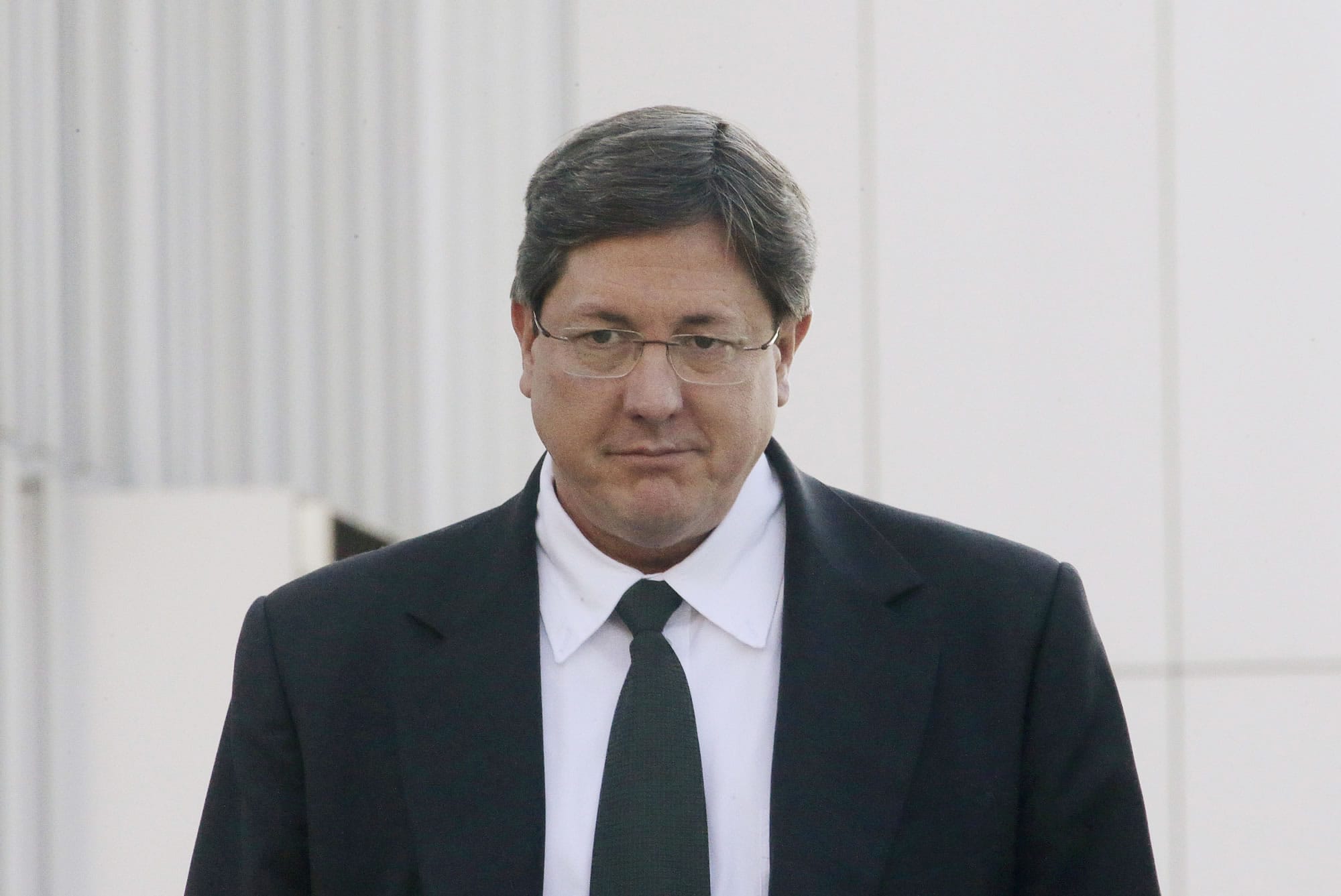 FILE - In this Jan. 21, 2015, file photo, polygamous sect leader Lyle Jeffs leaves the federal courthouse, in Salt Lake City. Polygamous sect leader Jeffs has been captured after being on the run for nearly a year. An FBI spokeswoman said Thursday, June 15, 2017, that Jeffs was arrested in South Dakota on Wednesday, June 14.