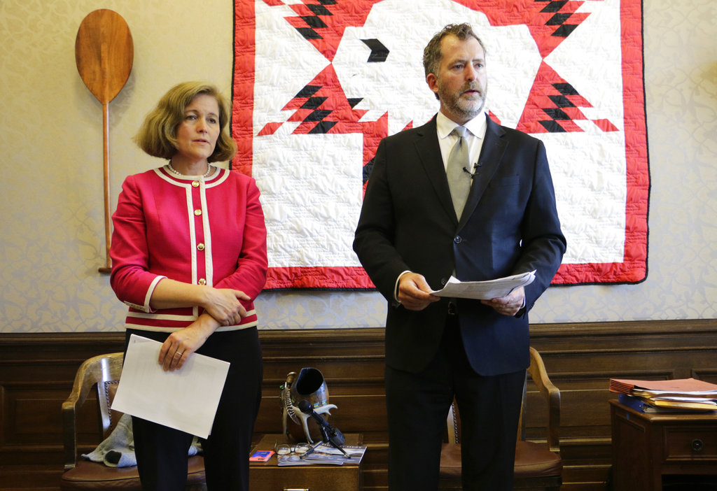 Democratic Sen. Christine Rolfes and Sen. Kevin Ranker talk to the media about the agreement reached on education funding June 29 in Olympia. Lawmakers say their budget compromise satisfies a state Supreme Court ruling that says the state must spend more money on schools.