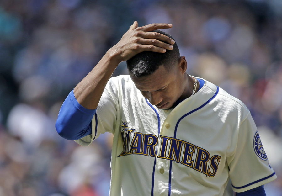 Seattle Mariners starting pitcher Ariel Miranda leaves a baseball game after being relieved in the eighth inning of a baseball game against the Houston Astros, Sunday, June 25, 2017, in Seattle.