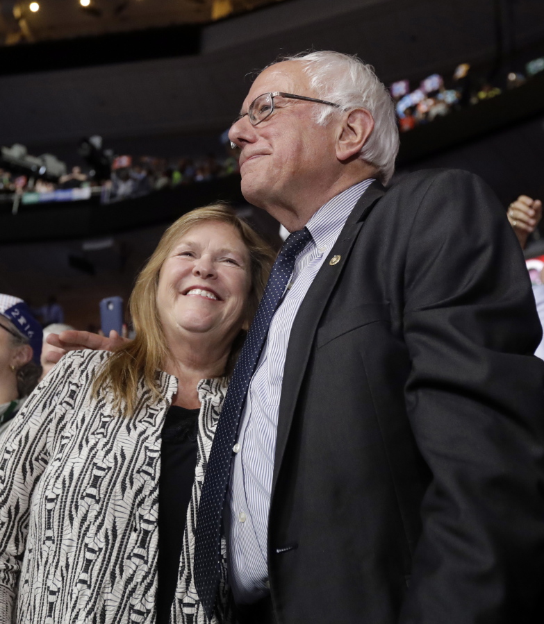 Former Democratic presidential candidate, Sen. Bernie Sanders, I-Vt., hugs wife Jane during the second day of the Democratic National Convention on July 26 in Philadelphia.