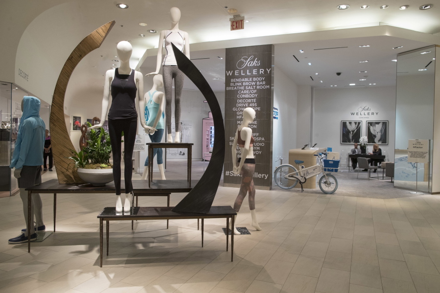 This Tuesday, May 30, 2017, photo, shows The Wellery on the second floor of the Saks Fifth Avenue flagship store in New York. Saks' New York flagship opened a 16,000-square foot wellness sanctuary in May that offers 1,200 different fitness classes, a salt chamber and meditation classes alongside wellness merchandise.
