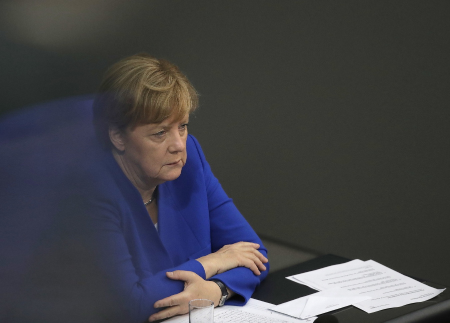 German Chancellor Angela Merkel listens to a debate of the German parliament Bundestag on the gay marriage in Berlin, Germany, Friday, June 30, 2017.