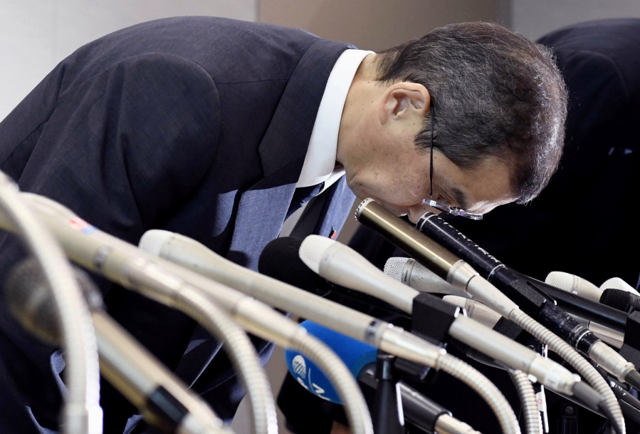 Japanese air bag maker Takata Corp. CEO Shigehisa Takada bows at the beginning of a press conference in Tokyo, Monday, June 26, 2017. Takata Corp. has filed for bankruptcy protection in Tokyo and the U.S., overwhelmed by lawsuits and recall costs related to its production of defective air bag inflators.