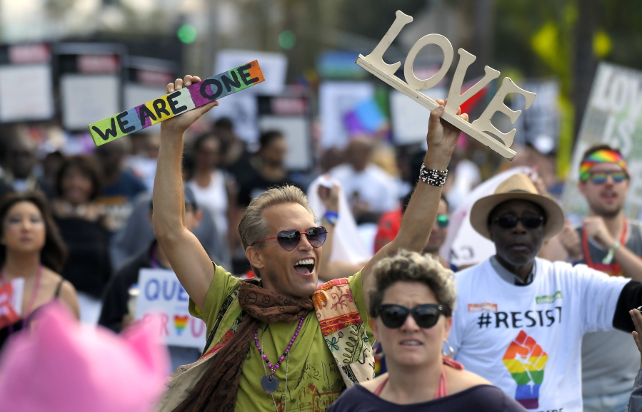 Marchers celebrate during the Los Angeles LGBTQ #ResistMarch Sunday in West Hollywood, Calif. Mark J.