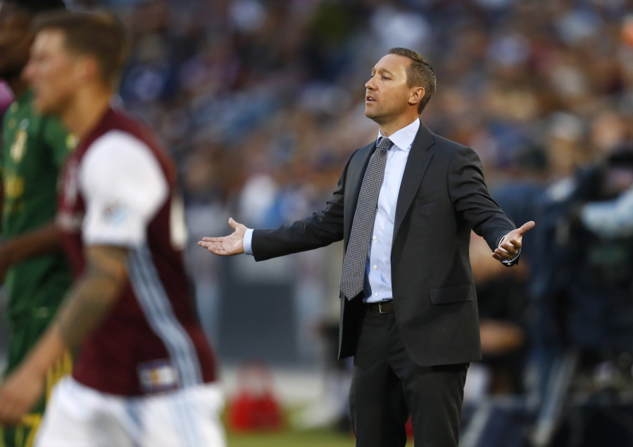 Portland Timbers head coach Caleb Porter pleads with referees for a call while facing the Colorado Rapids in the first half of an MLS soccer match Saturday, June 17, 2017, in Commerce City, Colo.