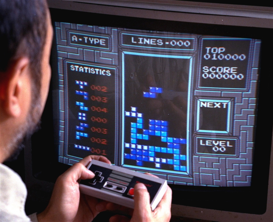 Tetris, an addictive brain-teasing video game, is played on the Nintendo Entertainment System in 1990.